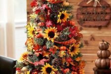 07 a bright Thanksgiving tree with pinecones, mini pumpkins, plaid ribbons, bright faux leaves and sunflowers