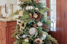 08 a chic Thanksgiving tree with oversized pinecones and white and metallic pumpkins, antlers, greenery and cotton balls