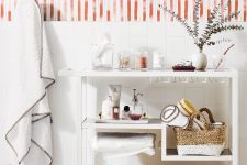 08 an elegant yet simple bathroom cart with baskets and jars for storage is a stylish furniture piece to rock