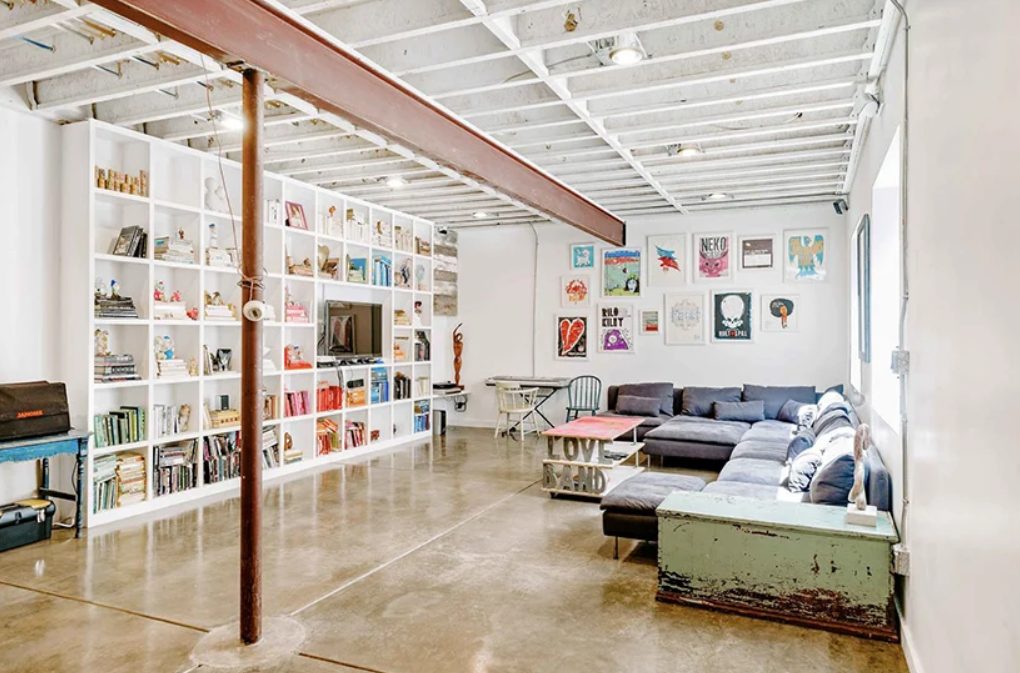 This is a reading and TV watching salon with much art and chic furniture