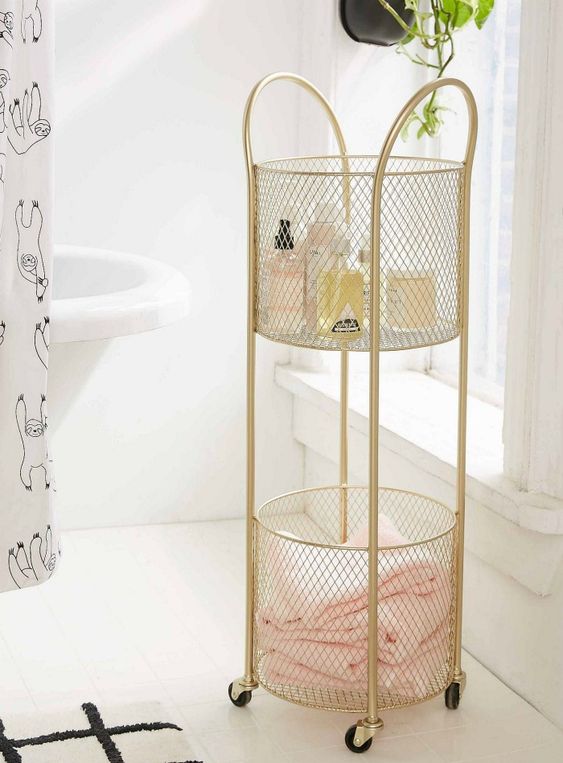 a refined gold net rolling cart is a lovely idea for a romantic or just girlish bathroom