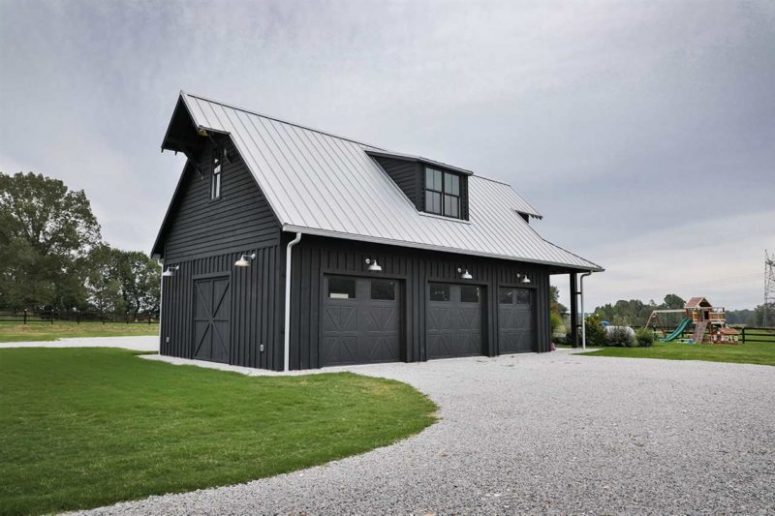 The barn is a three-car garage that was designed so not to spoil the look of the property