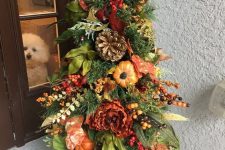 22 a fall tree with leaves, greenery, berries, bright blooms is a great outdoor decoration for Thanksgiving