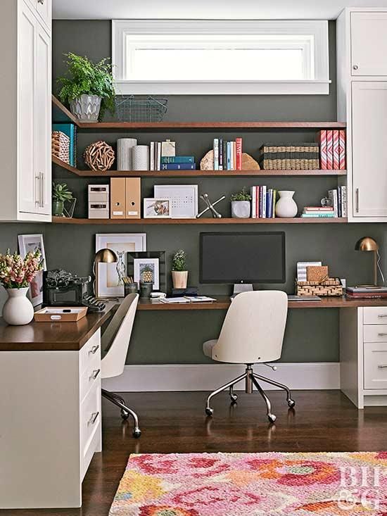 a farmhouse home office with kitchen cabinets, an L-shaped desk, white chairs, various stuff on the open shelves