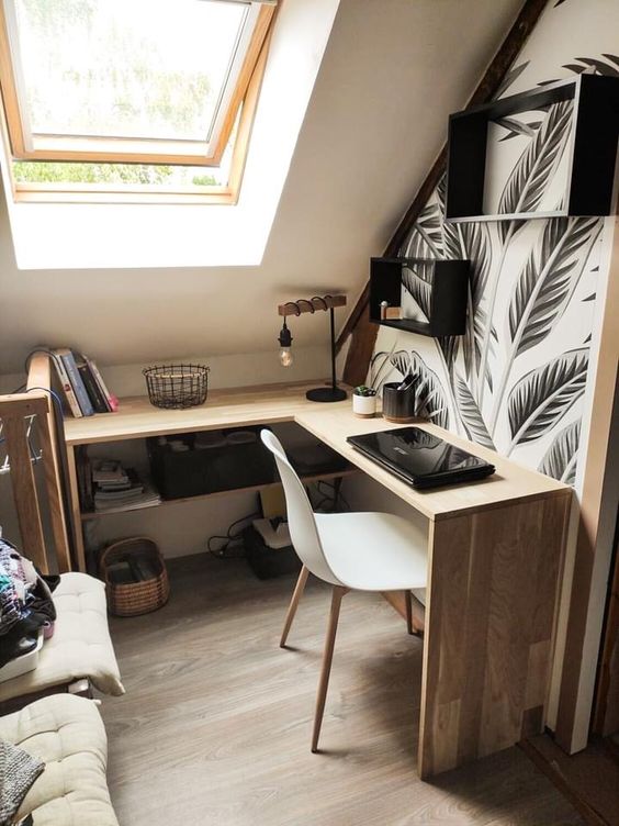 a small home office nook with a corner desk, a couple of box shelves and a chair is all you need for working