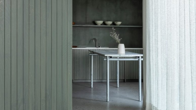 The decor is minimalist, with sleek lines and plain surfaces