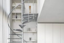 05 A galvanised-steel staircase connects the apartment’s two floors and here you may see white to refresh the space