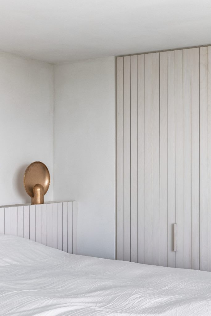 This white is continued to the bedrooms, and the joinery is creamy here, so the space echoes with both kitchen and other spaces