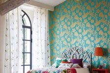 08 super bright turquoise and gold paetterned wallpaper for accenting a bold boho bedroom