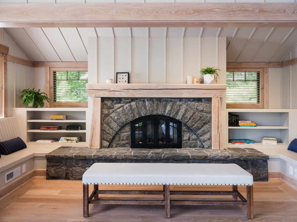 This is a very cozy space for reading and conversations, with a stone clad fireplace