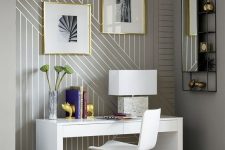 15 linear wallpaper accentuates this home tiny modern and very refined home office nook and makes it more chic