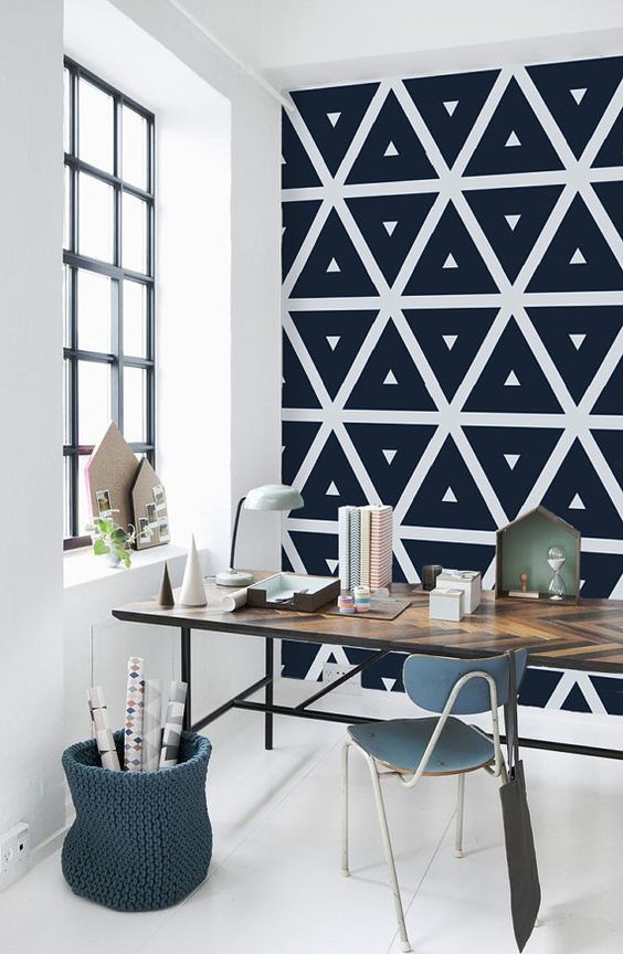 monochromatic geometric self-adhesive wallpaper is a great idea for a modern workspace, to make it bolder and statement-like
