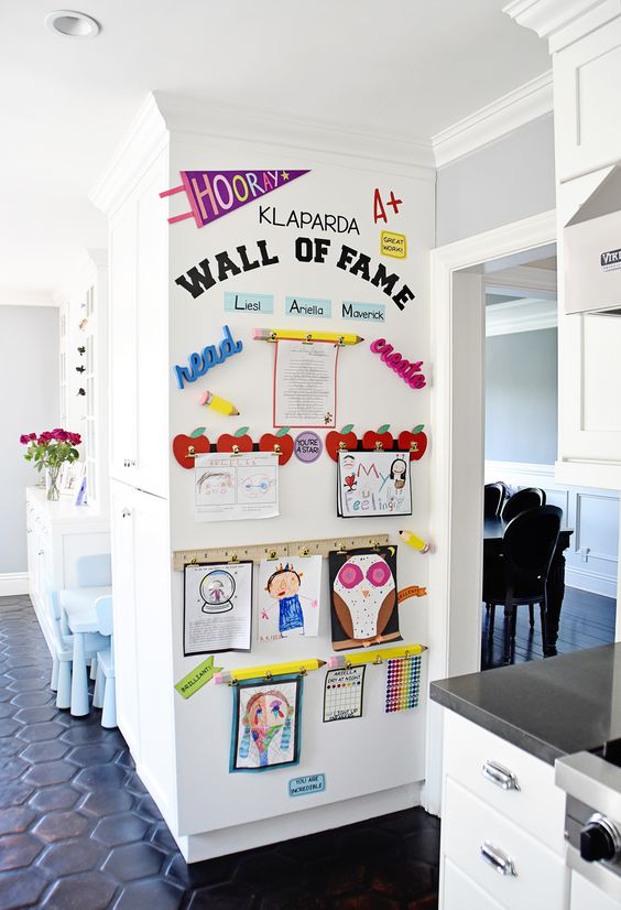 a wall of fame is a gorgeous way to make your kids feel proud of what they have created