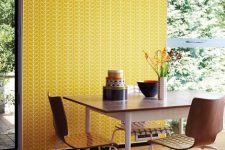24 bold yellow and white printed retro sixties’ wallpaper accentuates a breakfast nook and brings color and pattern here