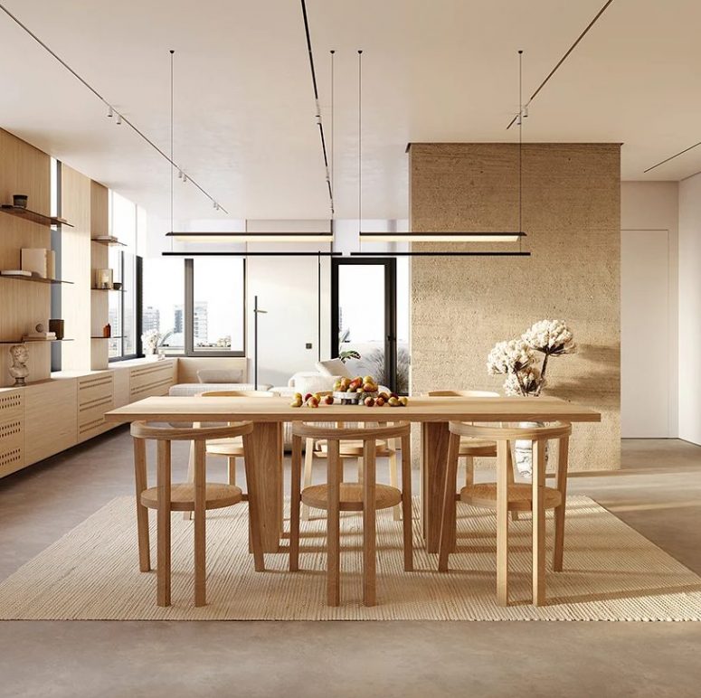This all natural and warm colored apartment is a lovely dwelling to live in, there's much natural wood in light shades and microcement to comeplete the look