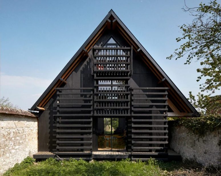 Black Rural House Featuring Minimalist Interiors
