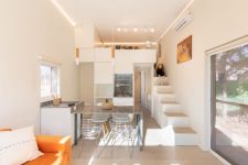 03 The rest of the functions are clustered on the ground floor in an open floor plan