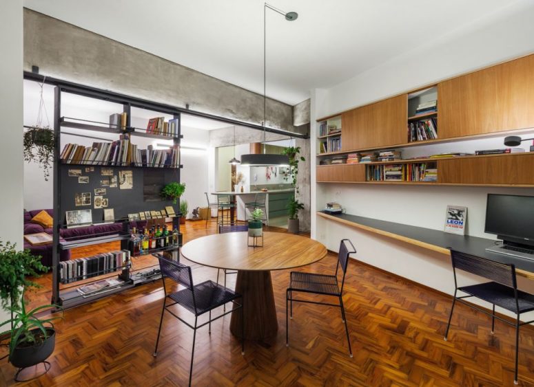By removing the glass enclosure around the balcony the designers expanded the living area and filled it with light By removing the glass enclosure around the balcony the designers expanded the living area and filled it with light