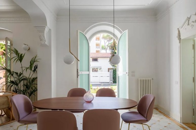 An arched door opens the space to outdoors and let the views