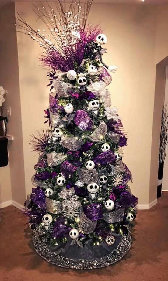 a Christmas tree with silver and purple ribbons, Jack Skellington ornaments, twigs and beads and shiny ornaments is a statement