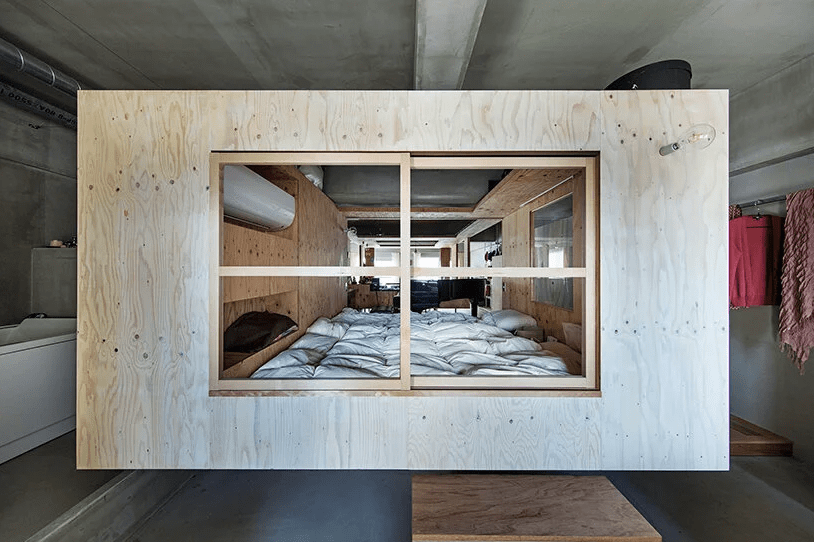 This unique house features a suspended nest right inside it, and no space dividers besides it