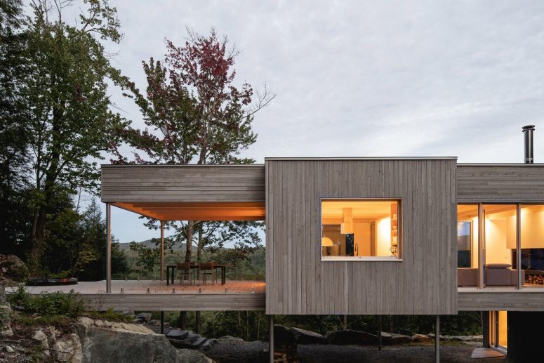 There's a raised terrace that extends indoor spaces outdoors
