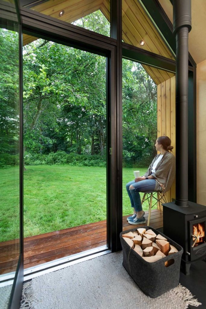 There's a small deck and a hearth inside the house, right at the entrance