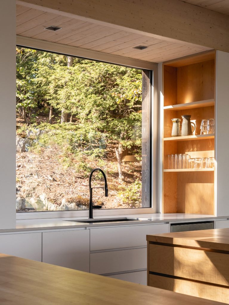 The kitchen islands are among several elements made from solid maple