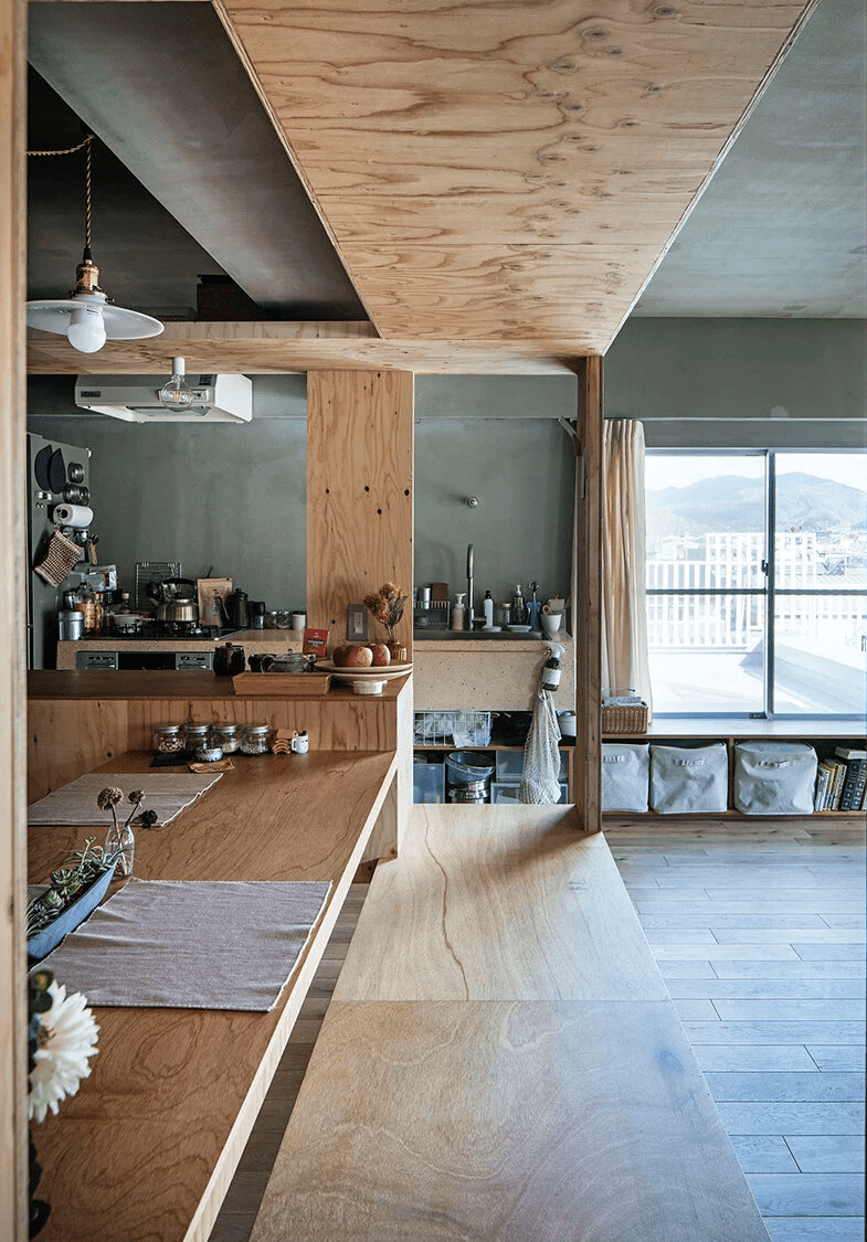 The rest of the house is done of concrete, wood and plywood, big windows allow much natural light inside