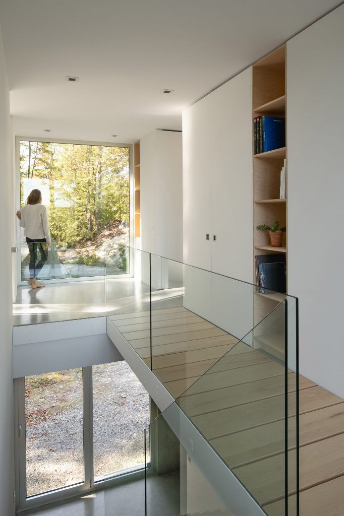 A staircase separates the living spaces from the master bedroom