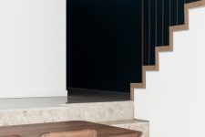 07 Light-colored terrazzo is extended from indoors to outdoors helping the spaces to merge