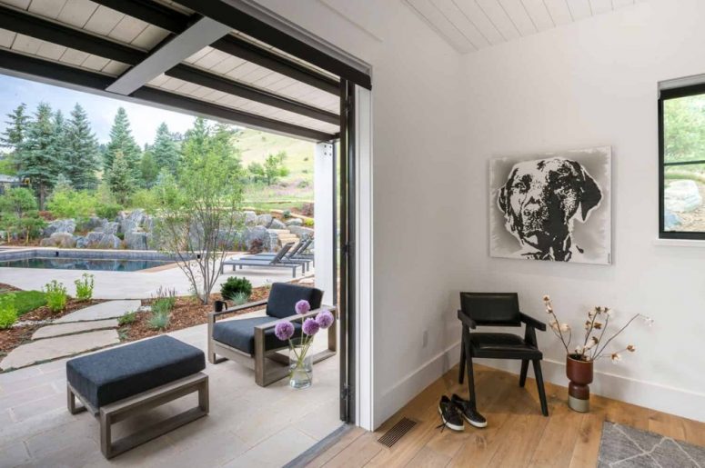 Sliding doors offer easy access into the garden and the courtyard from every section of the house