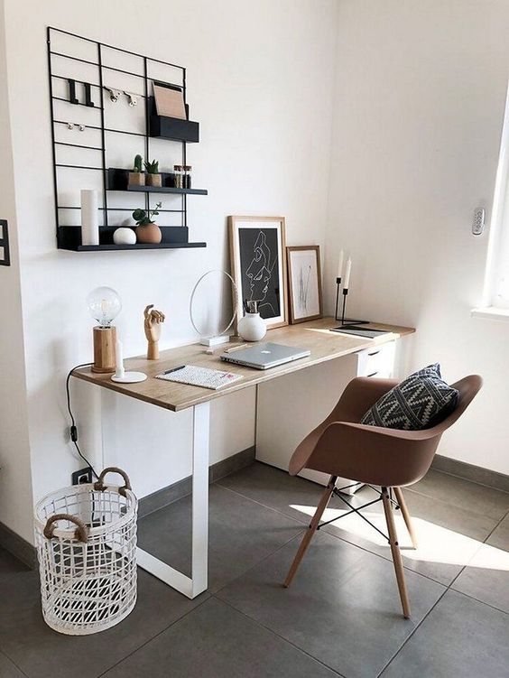 a stylish contemporary home office with a window that gives enough natural light but not too much