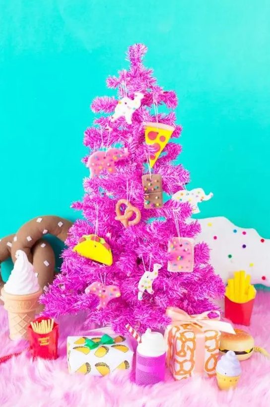 a hot pink Christmas tree decorated with junk food clay ornaments is a very bold color statement that inspired and strikes