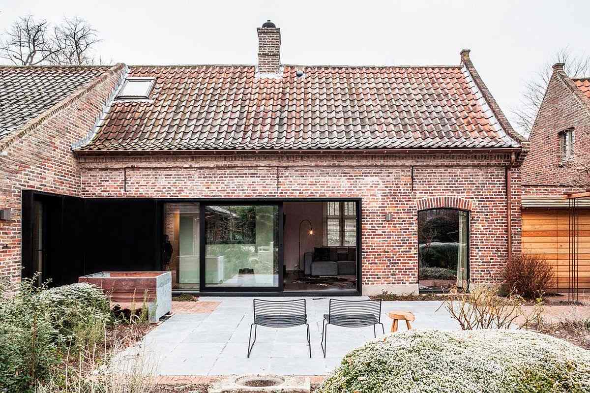 This farmhouse in Belgium was renovated to make the interiors calm, open and light filled
