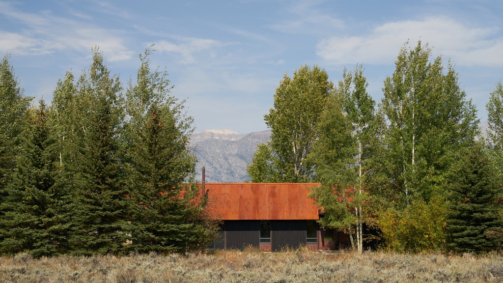 The house has a corrugated steel roof on top and amazing views around