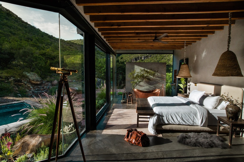 The interiors are contemporary, with much concrete, simple and stylish furniture, wooden beams and jute and wicker The interiors are contemporary, with much concrete, simple and stylish furniture, wooden beams and jute and wicker