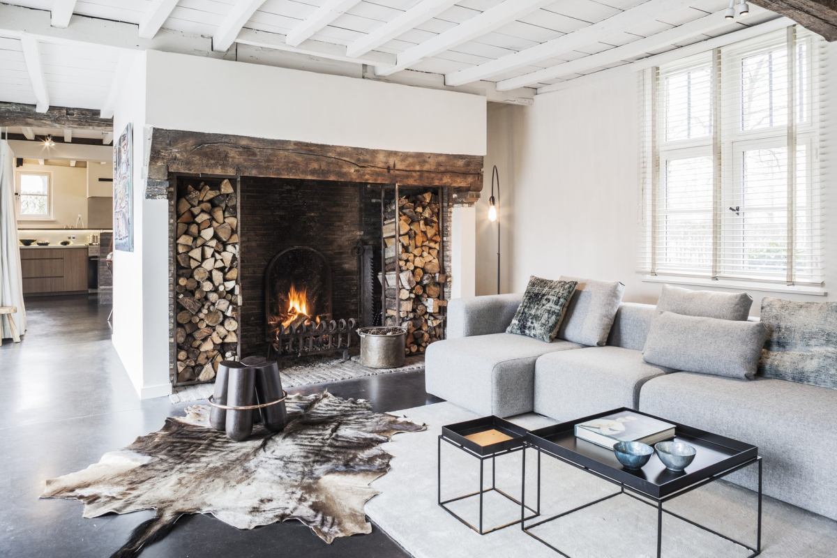 it's a cool idea to store firewood near the fireplace