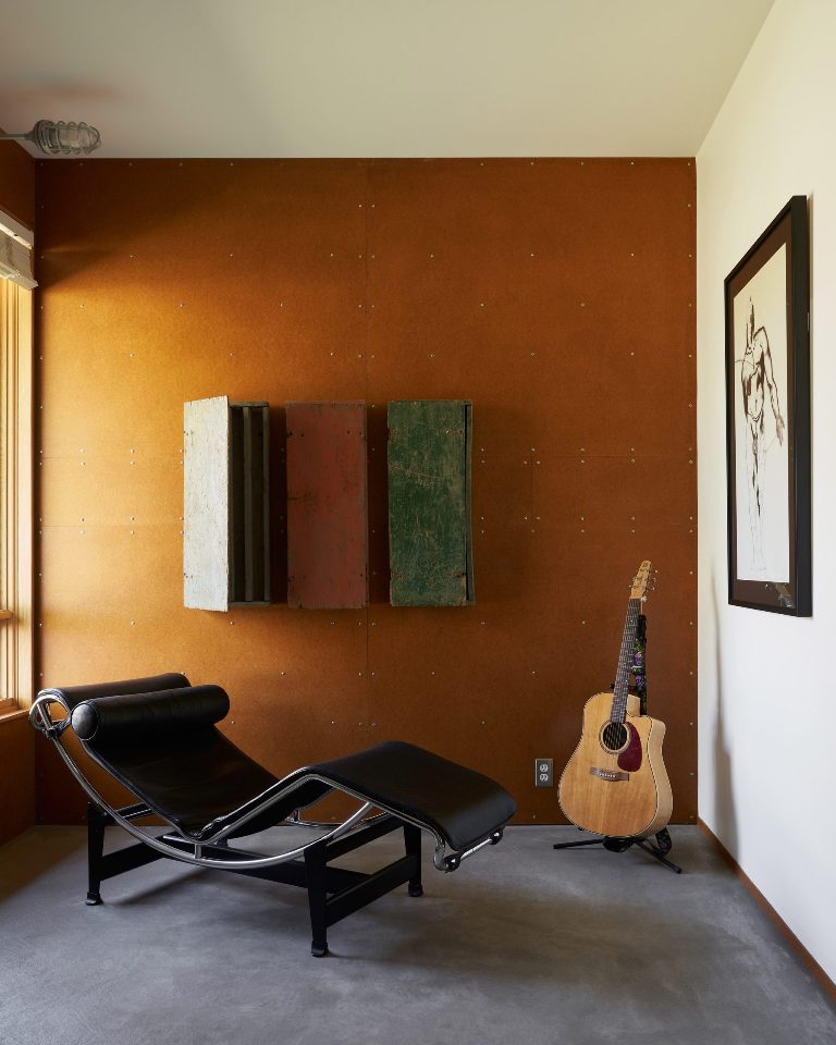 Panels of masonite clad the walls