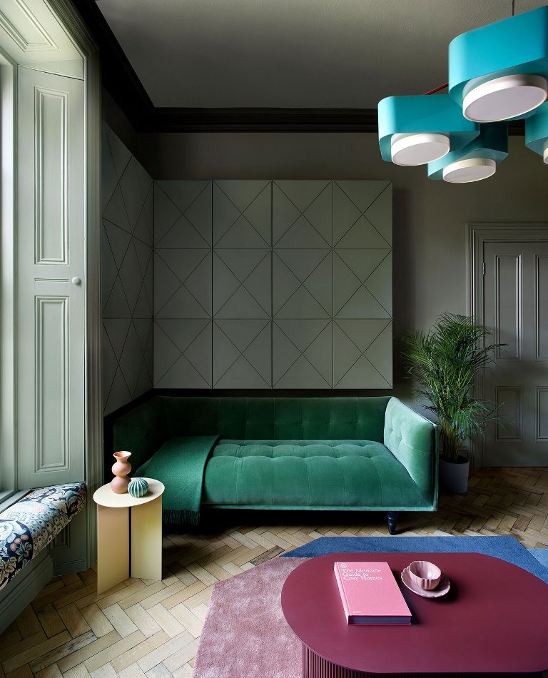 This luxurious house is a renovated Victorian terrace house done in jewel tones and with chic touches