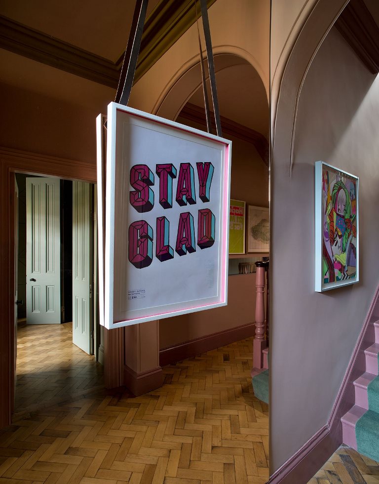 Bold colors and modern artworks give a fresh modern feel to this vintage house