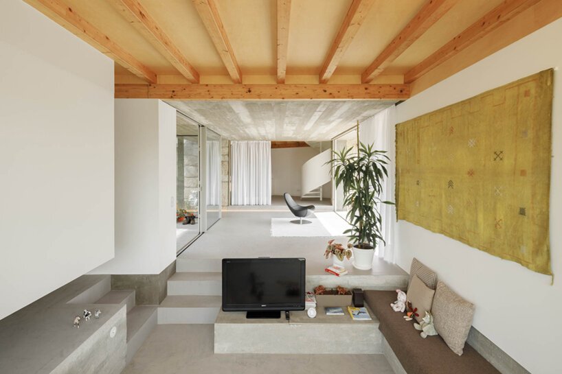 a sunken living room is a stylish solution for this remodel