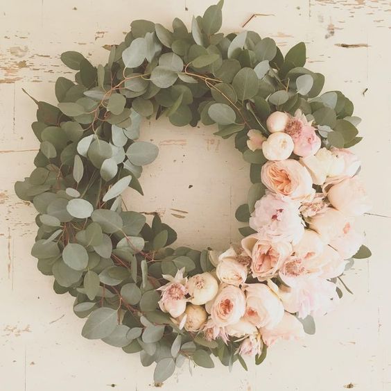 a eucalyptus and pink peony wreath is absolute beauty for any front door, whether it's a spring or summer one