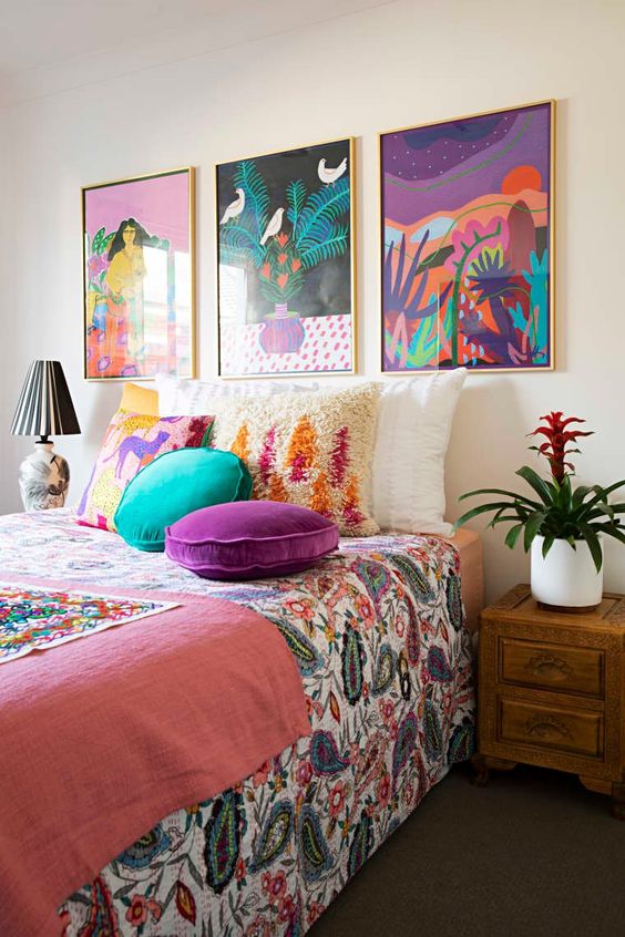 a cheerful grid gallery wall in bright colors and in gilded frames will make a colorful statement in your space