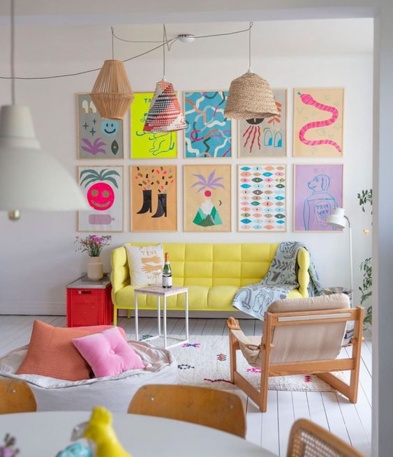 a colorful neon gallery wall with fun abstract and primitive posters will add a funky and bright touch to the space