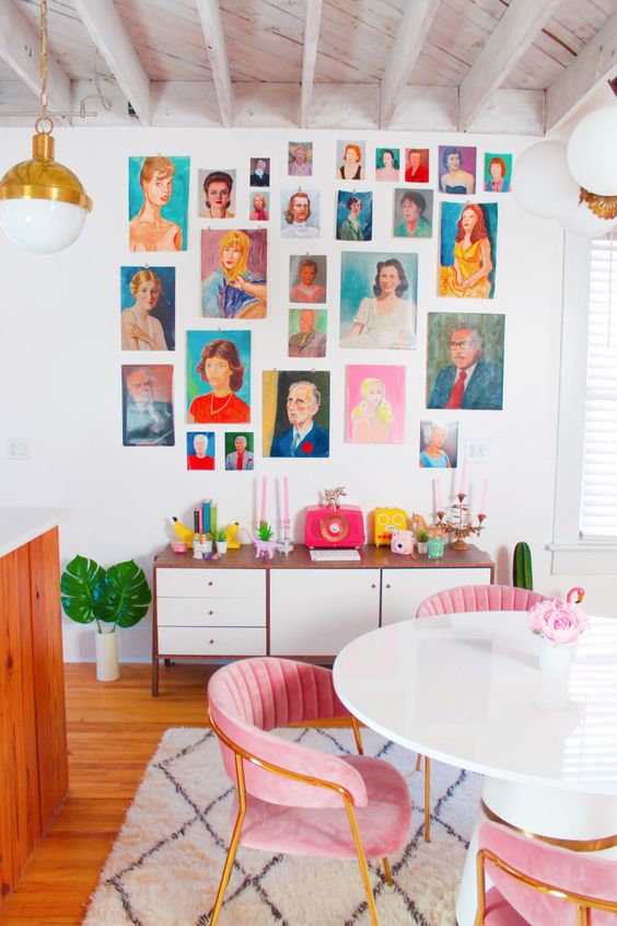 a colorful portrait gallery wall with no frames included will add personality and a bold touch to the space
