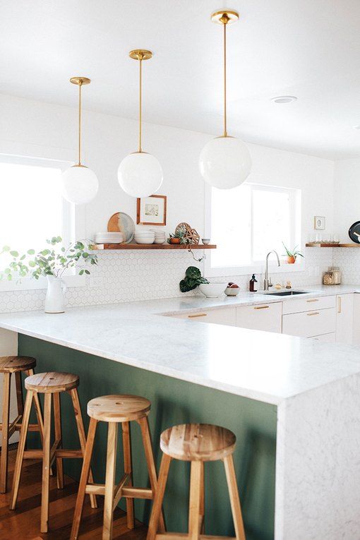 a cute neutral kitchen design with an island