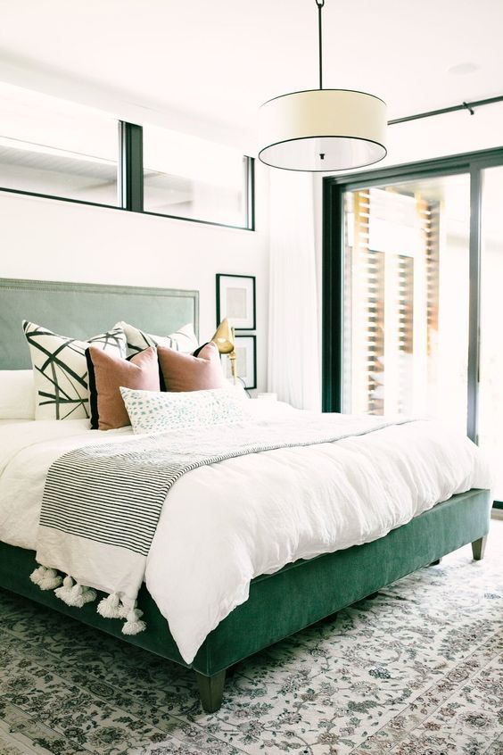 a cute green-white bedroom design
