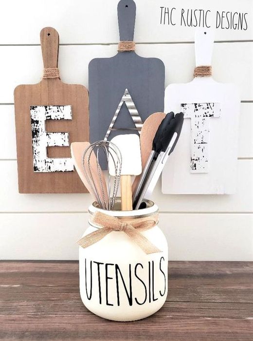 kitchen wall decor with cutting boards and monograms is a lovely idea for a rustic space and it's pure fun
