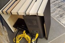 10 a box featuring fake books is a lovely space to hide any router or other electronics and looks very stylish